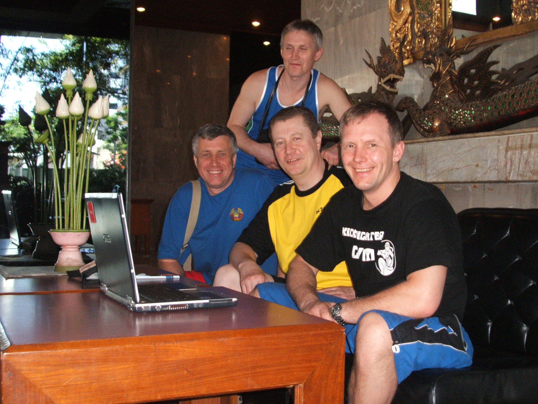Team Belarus World Championship management in Bangkok hotel lobby, all smiling after Darron shouted he needed a photo for Ronnie Green